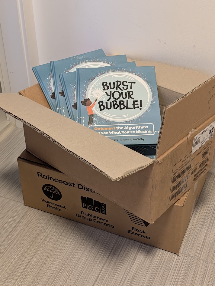 copies of burst your bubble ready to be delivered to the public schools